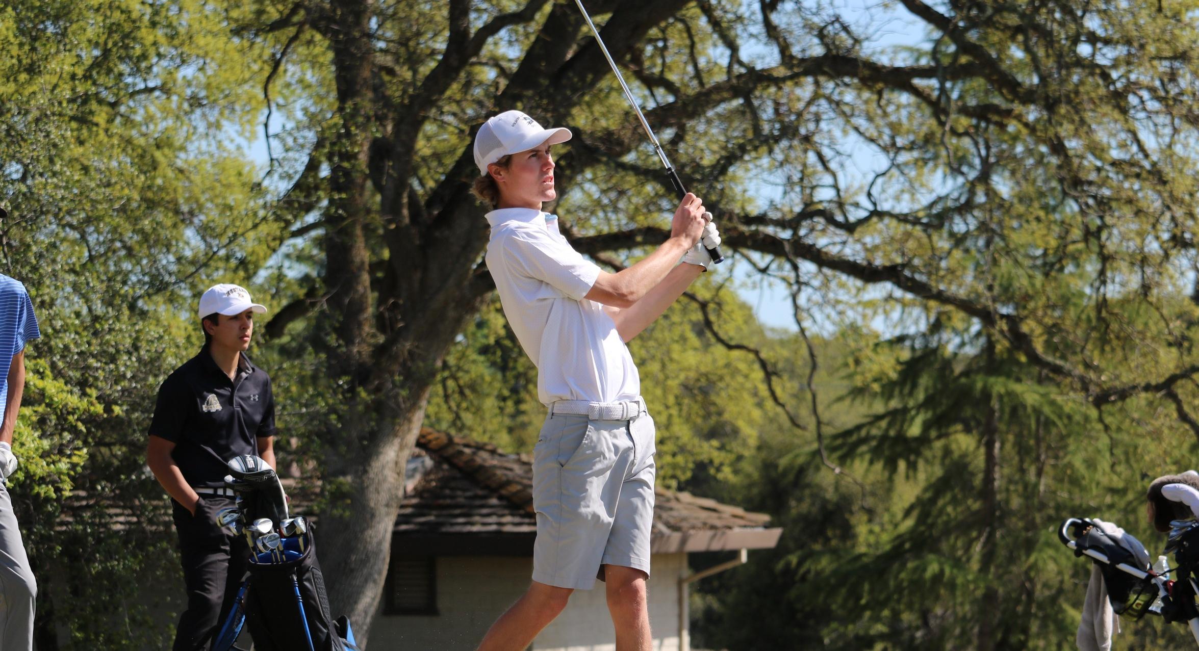 Golfers win another tournament, this time by just two strokes!